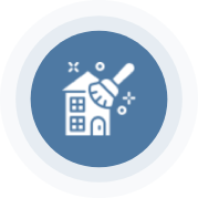 A blue circle with a white house and a cleaning brush.